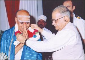 Vidwan Sharma being honoured by His Excellency T. N. Chaturvedi the Honourable Governor of Karnataka (2006)